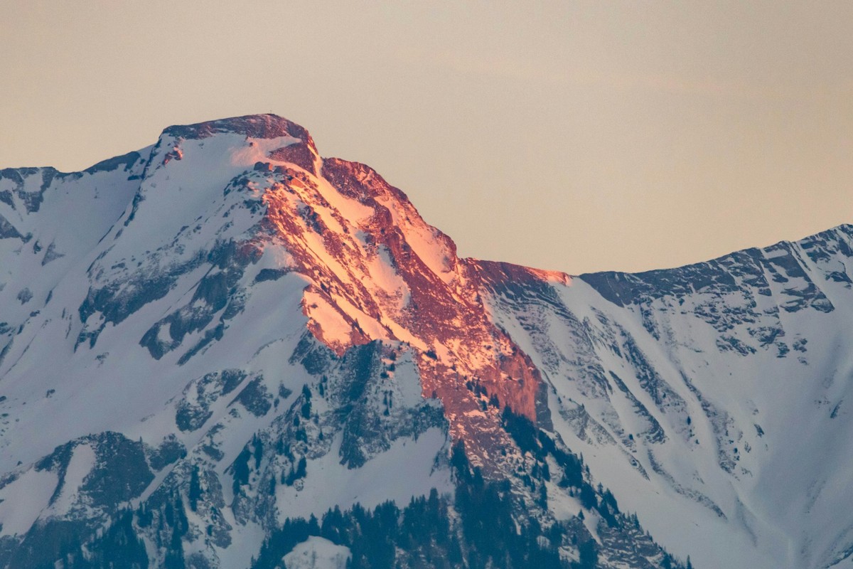 Sunrise over alpine peaks